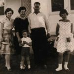 Zampin family, outside family home, c 1962